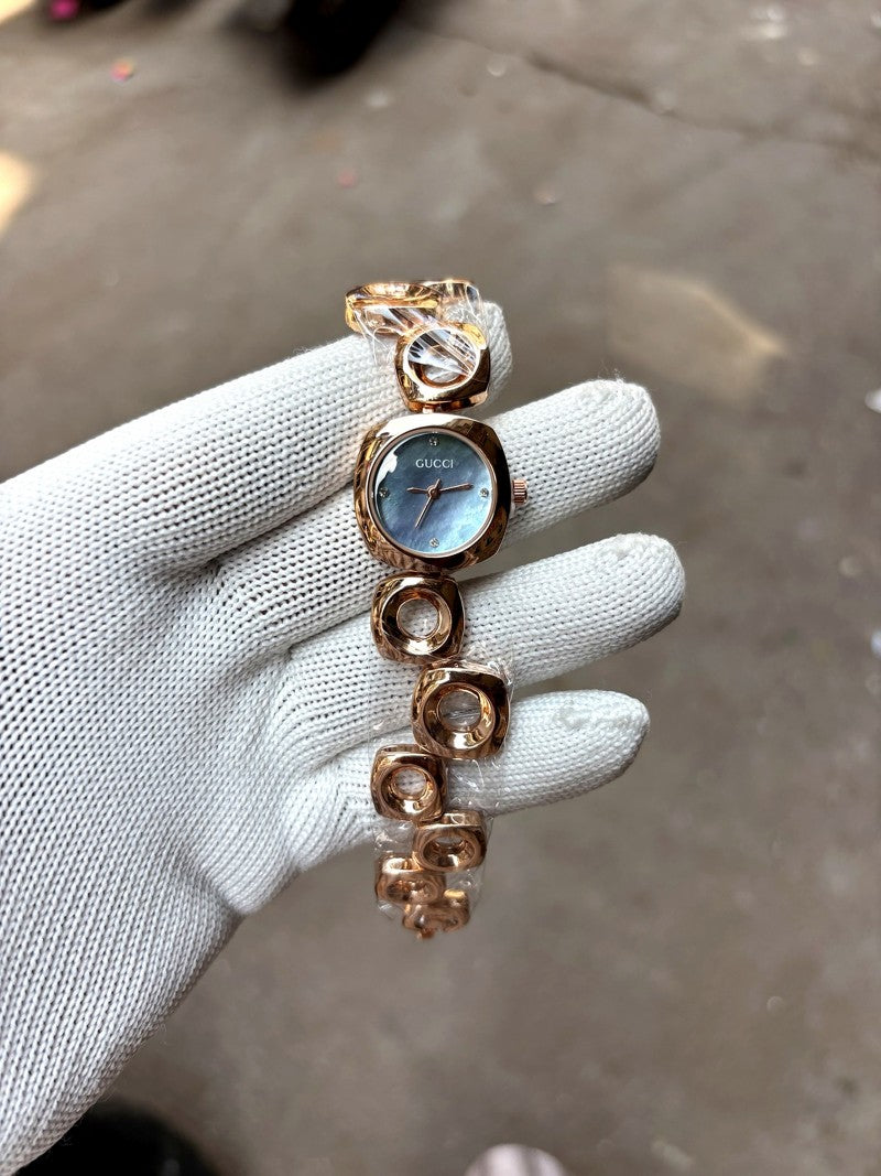 Gucci blue dial rose gold bracelet chain ladies watch