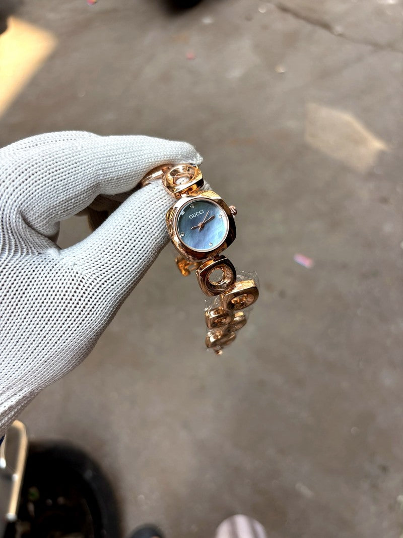 Gucci blue dial rose gold bracelet chain ladies watch
