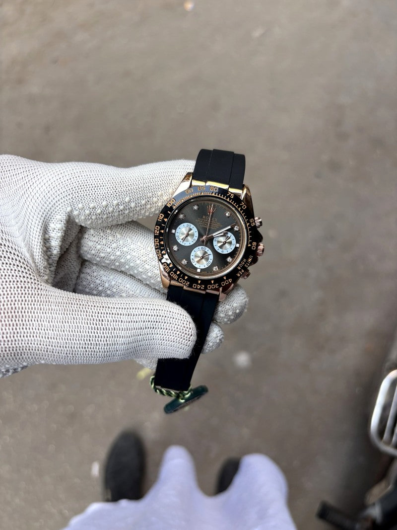 cosmograph daytona everose gold ceramic bezel black and sundust diamond dial oysterflex