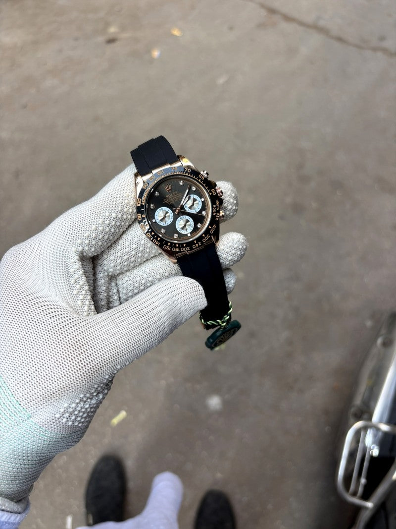 cosmograph daytona everose gold ceramic bezel black and sundust diamond dial oysterflex