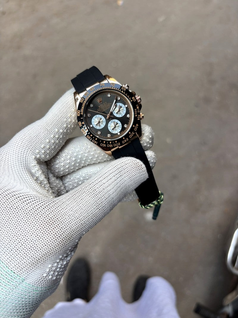 cosmograph daytona everose gold ceramic bezel black and sundust diamond dial oysterflex