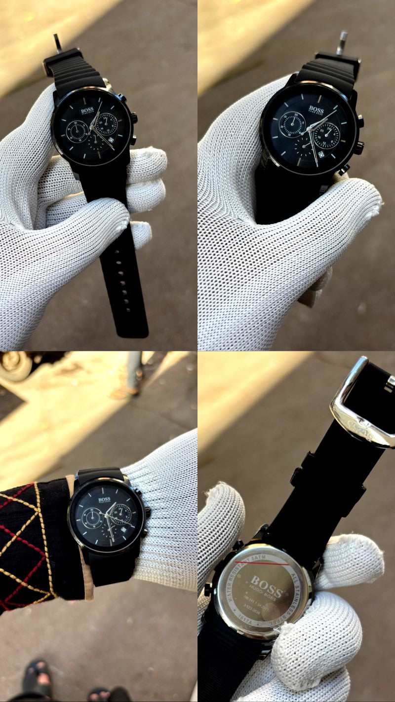 Hugo Boss full black chronograph model featuring a black dial and a matching black silicone strap