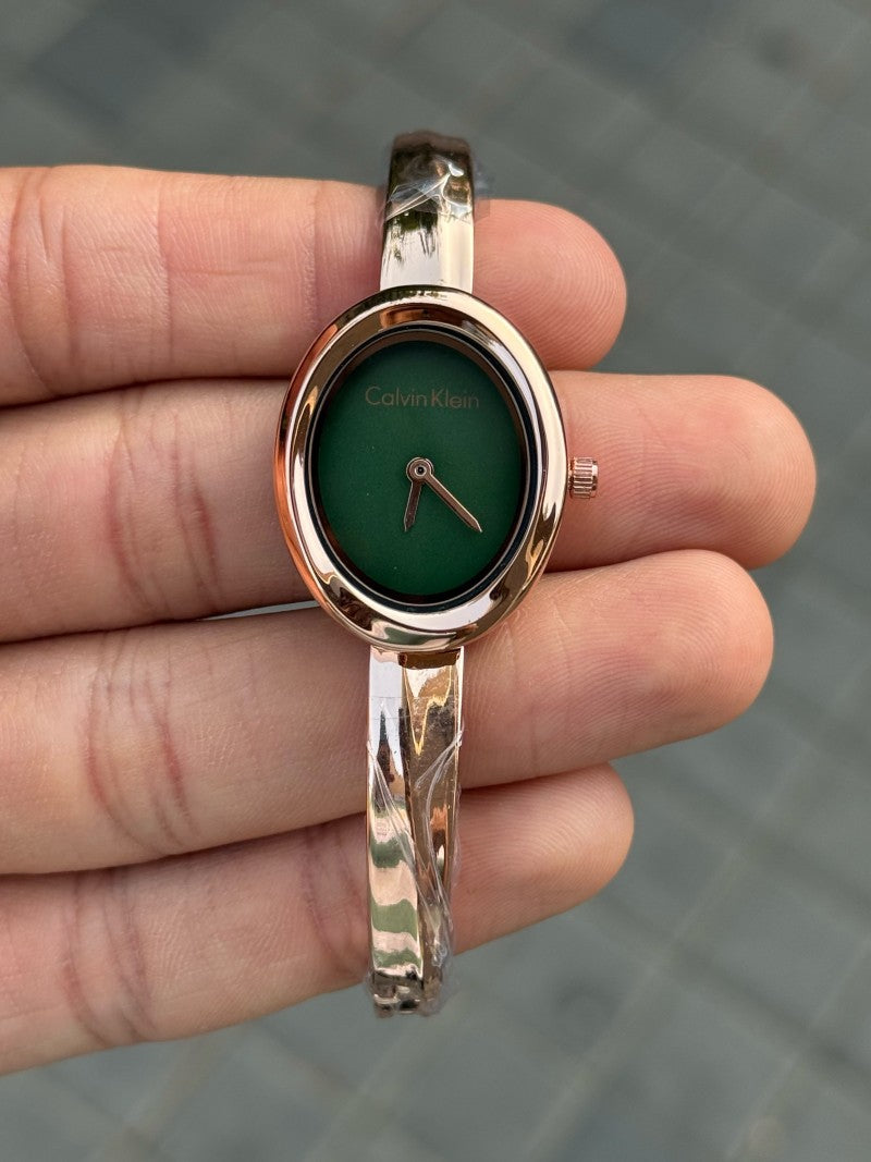 Calvin Klei n Oval Twisted Bezel Women Rose Green