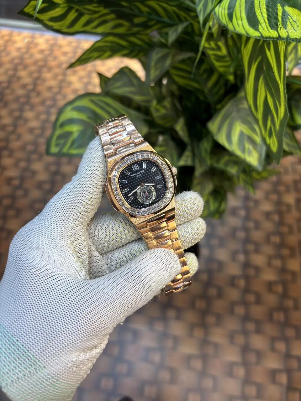 Patek Philippe Nautilus baguette diamond-set bezel.