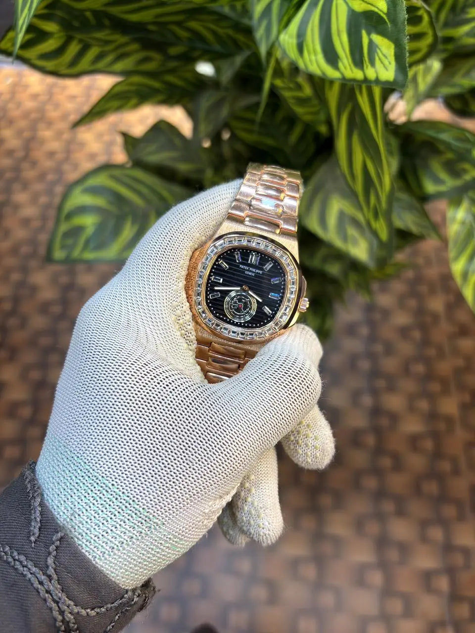 Patek Philippe Nautilus baguette diamond-set bezel.