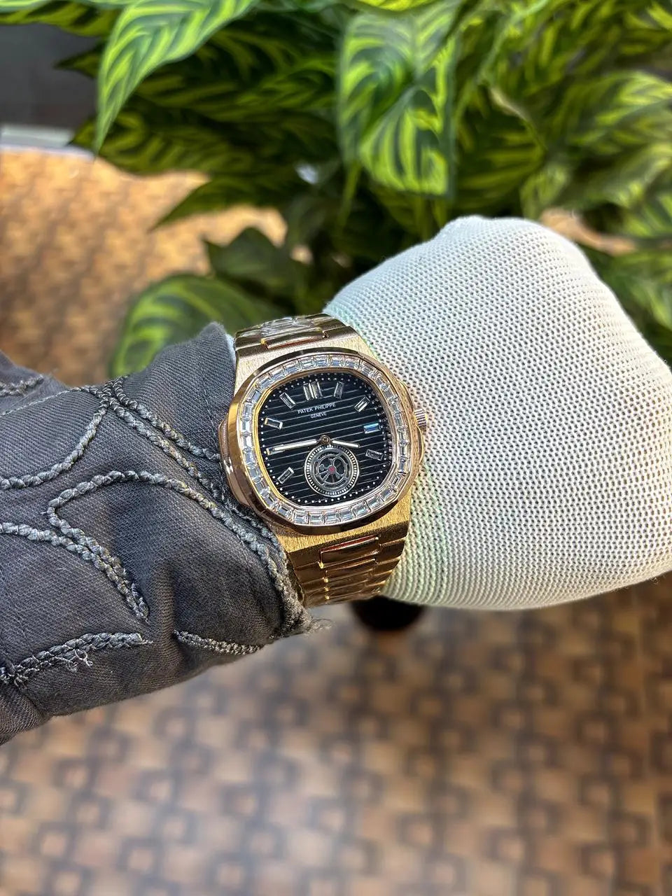 Patek Philippe Nautilus baguette diamond-set bezel.