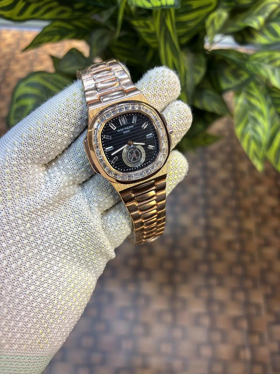 Patek Philippe Nautilus baguette diamond-set bezel.