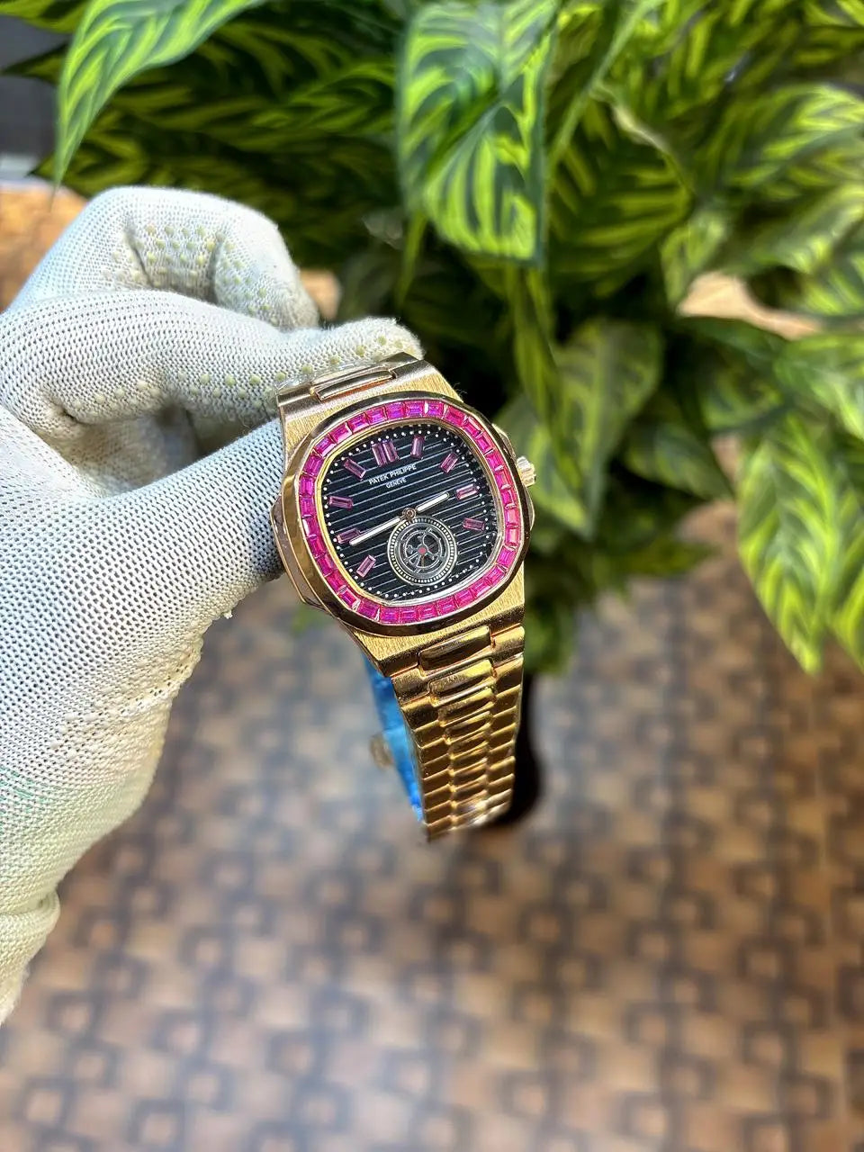 Patek Philippe Nautilus baguette diamond-set bezel.